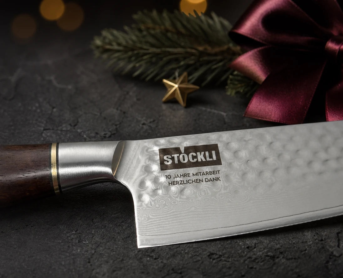 MISAKI Damascus knife with Stöckli engraving in a Christmas setting